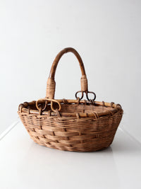 vintage woven gathering basket with bamboo handle