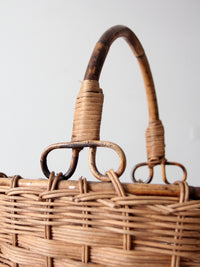 vintage woven gathering basket with bamboo handle