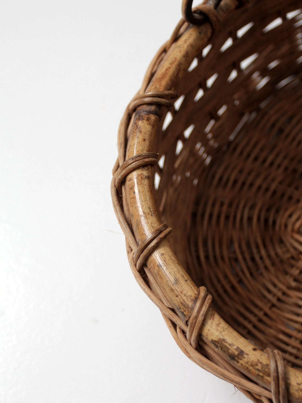 vintage woven gathering basket with bamboo handle