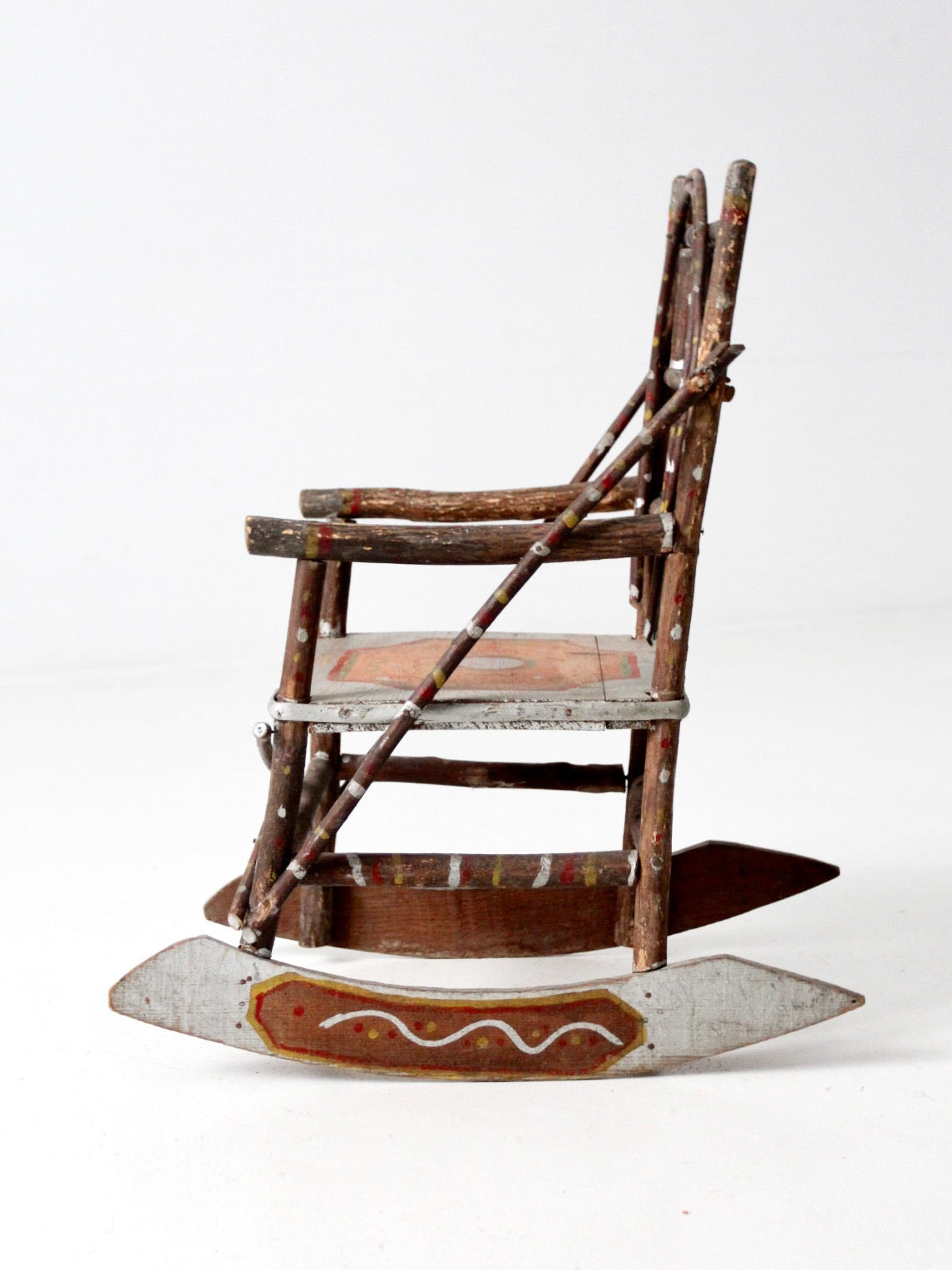 antique Adirondack folk art children's rocking chair