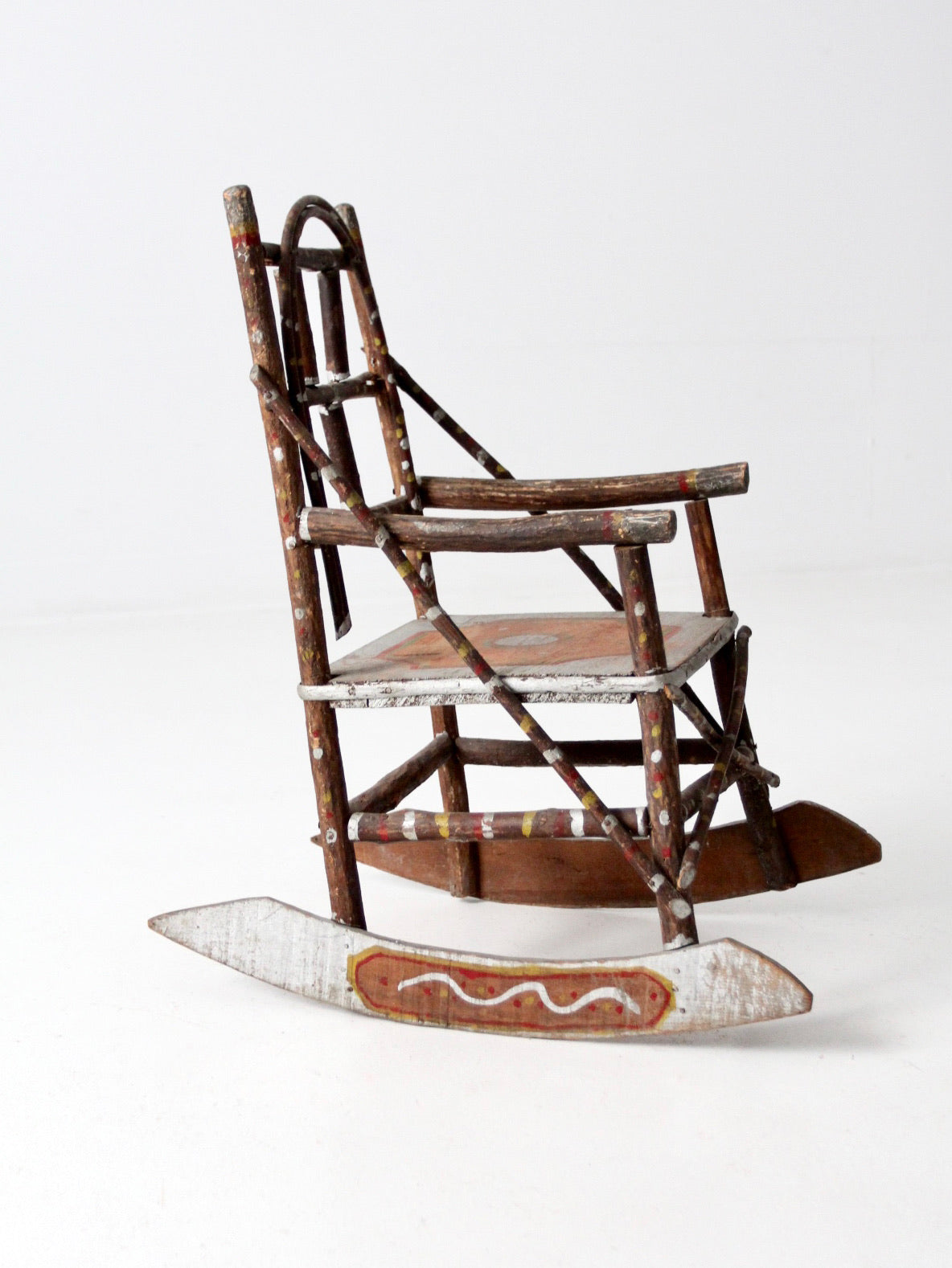 antique Adirondack folk art children's rocking chair