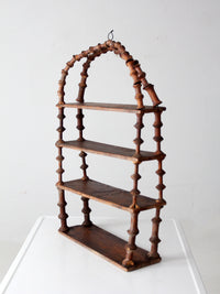 antique folk art spool shelf