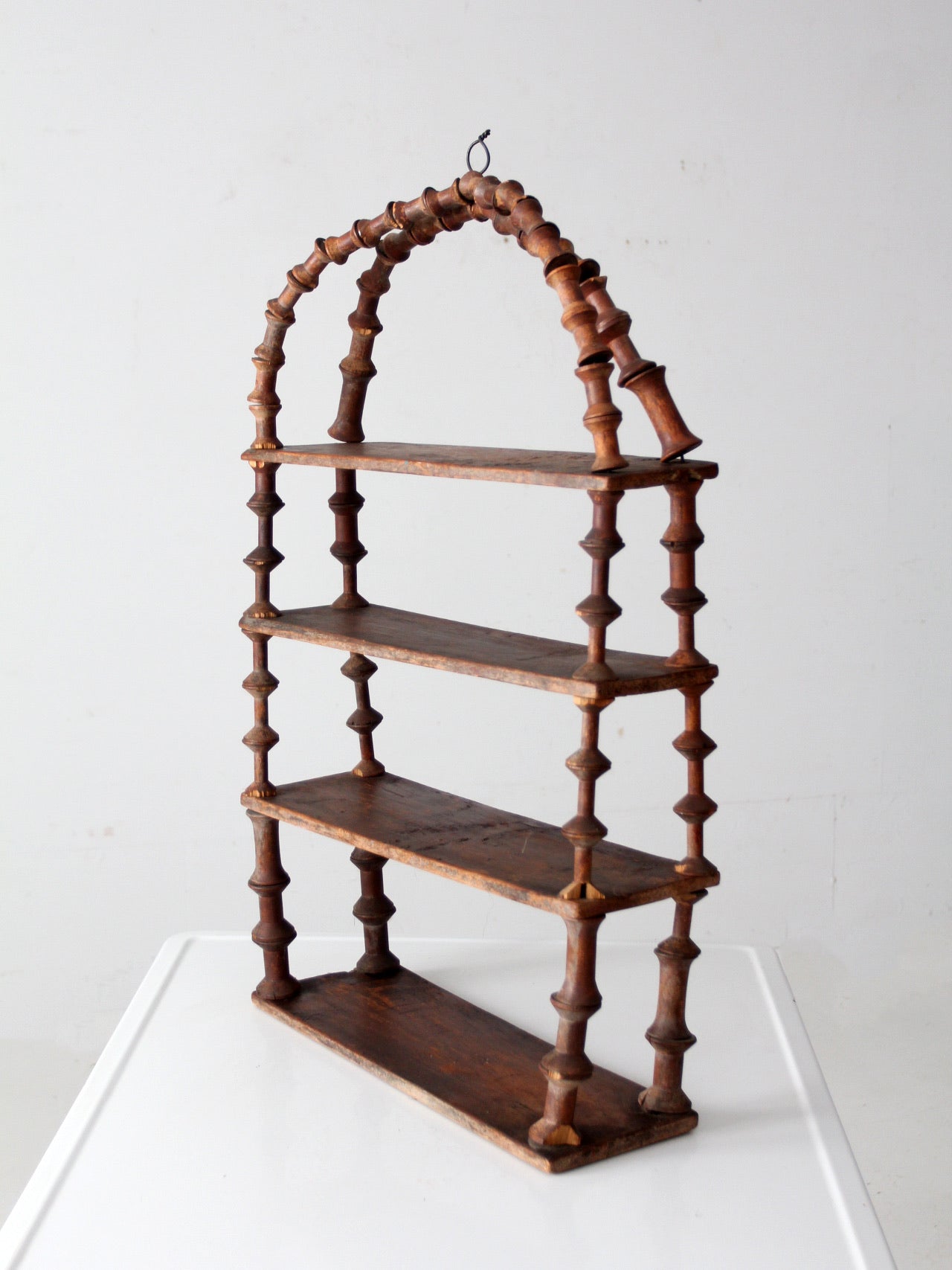 antique folk art spool shelf