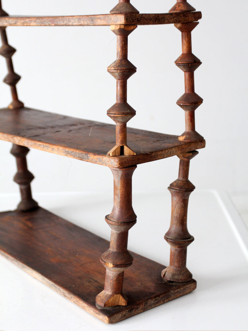 antique folk art spool shelf