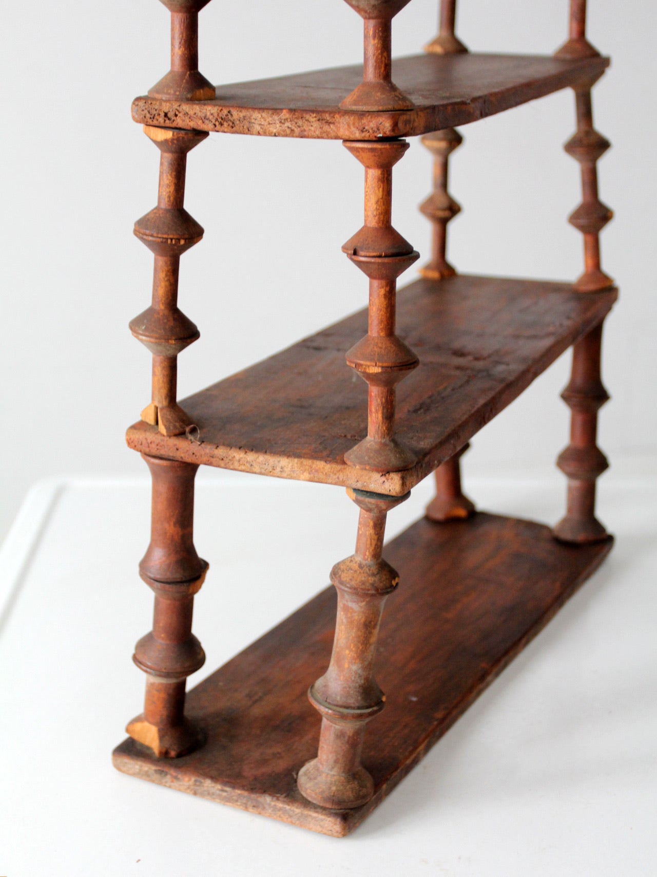 antique folk art spool shelf
