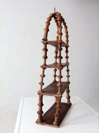 antique folk art spool shelf