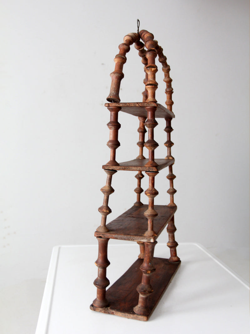 antique folk art spool shelf