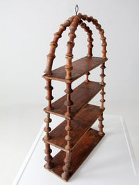 antique folk art spool shelf