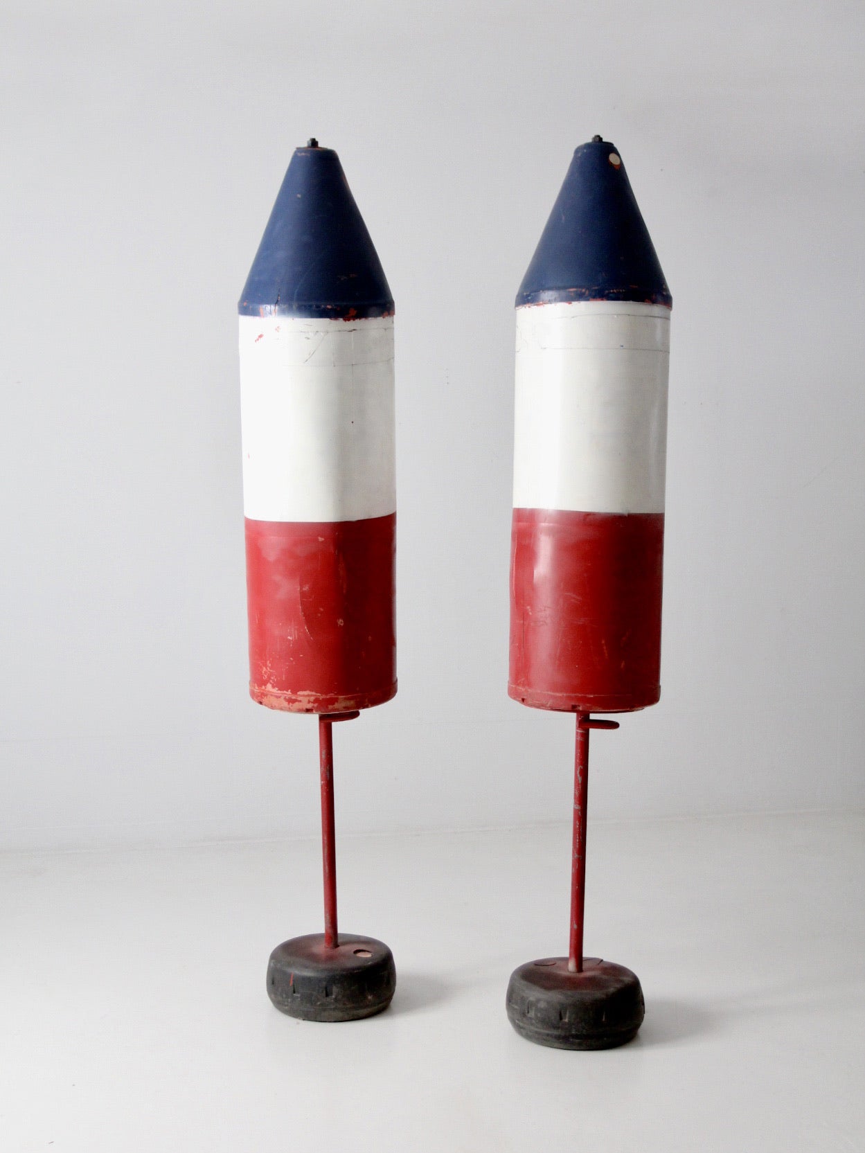 pair of vintage nautical marker buoys
