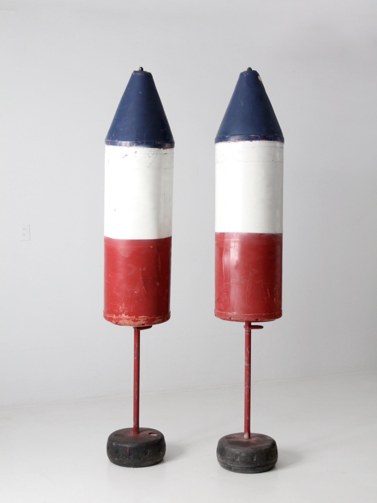pair of vintage nautical marker buoys