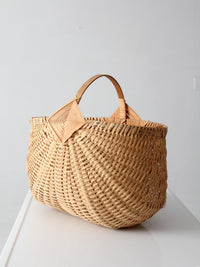 vintage wicker buttocks basket with floral trim