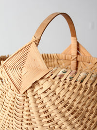 vintage wicker buttocks basket with floral trim