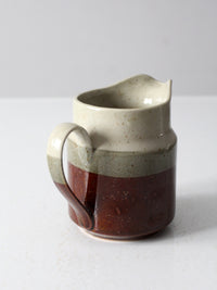 vintage Takashi pottery pitcher