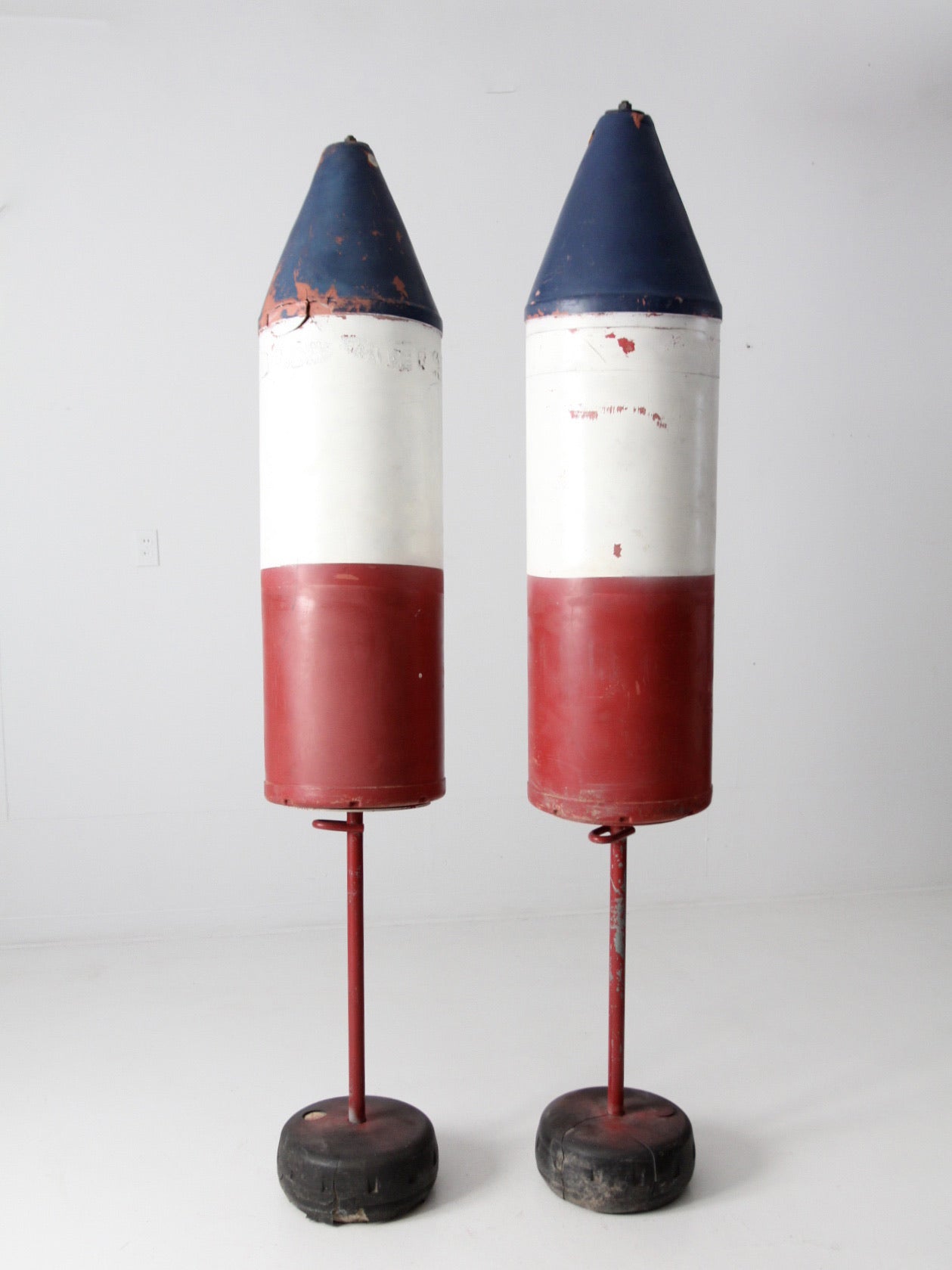 pair of vintage nautical marker buoys