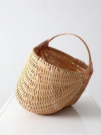 vintage wicker buttocks basket with floral trim