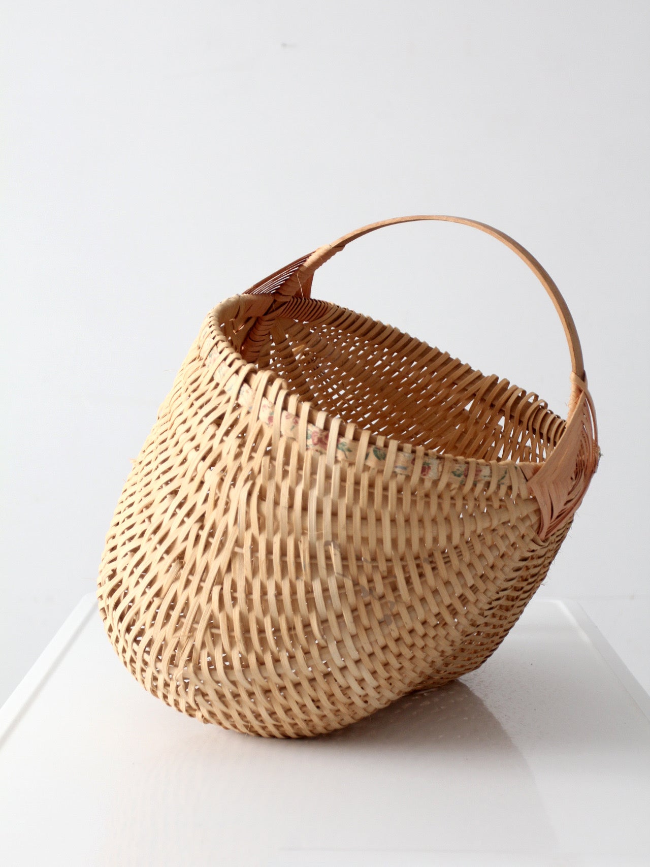 vintage wicker buttocks basket with floral trim