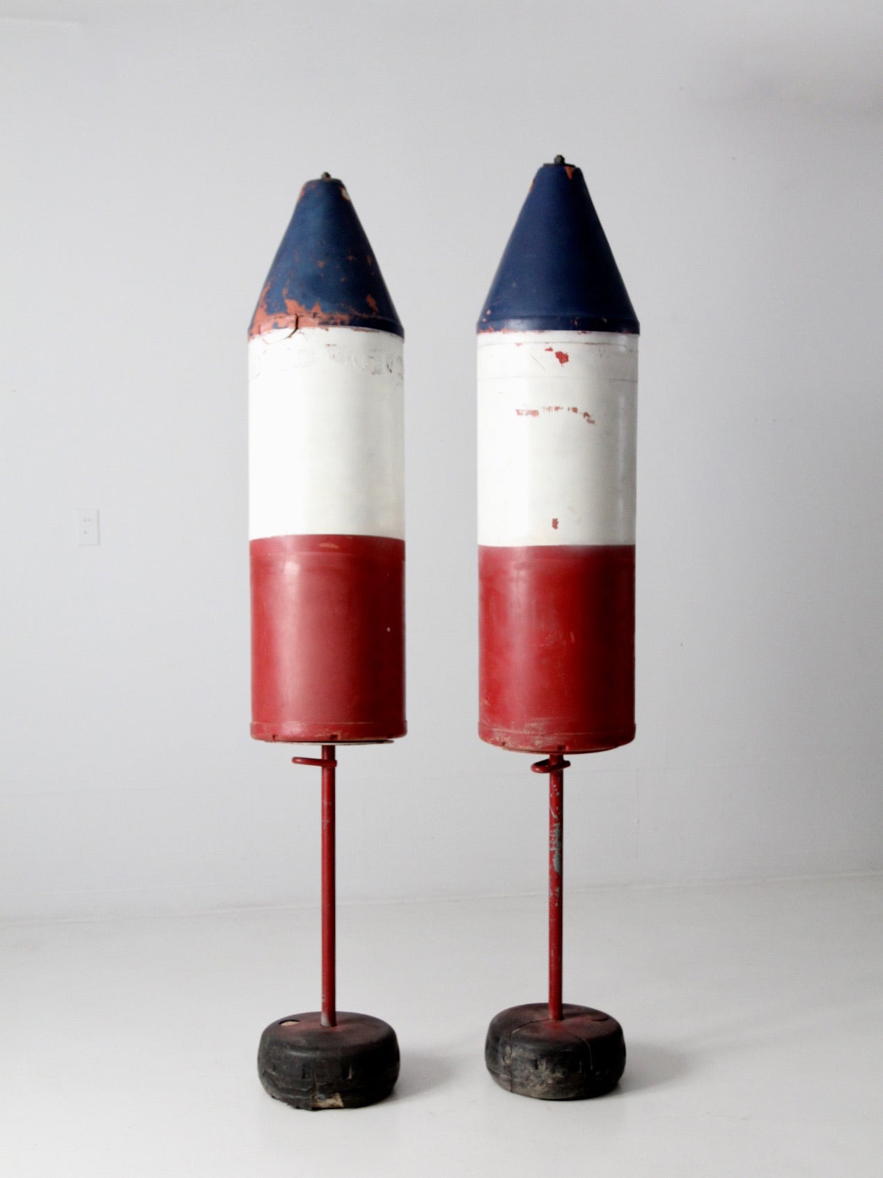 pair of vintage nautical marker buoys