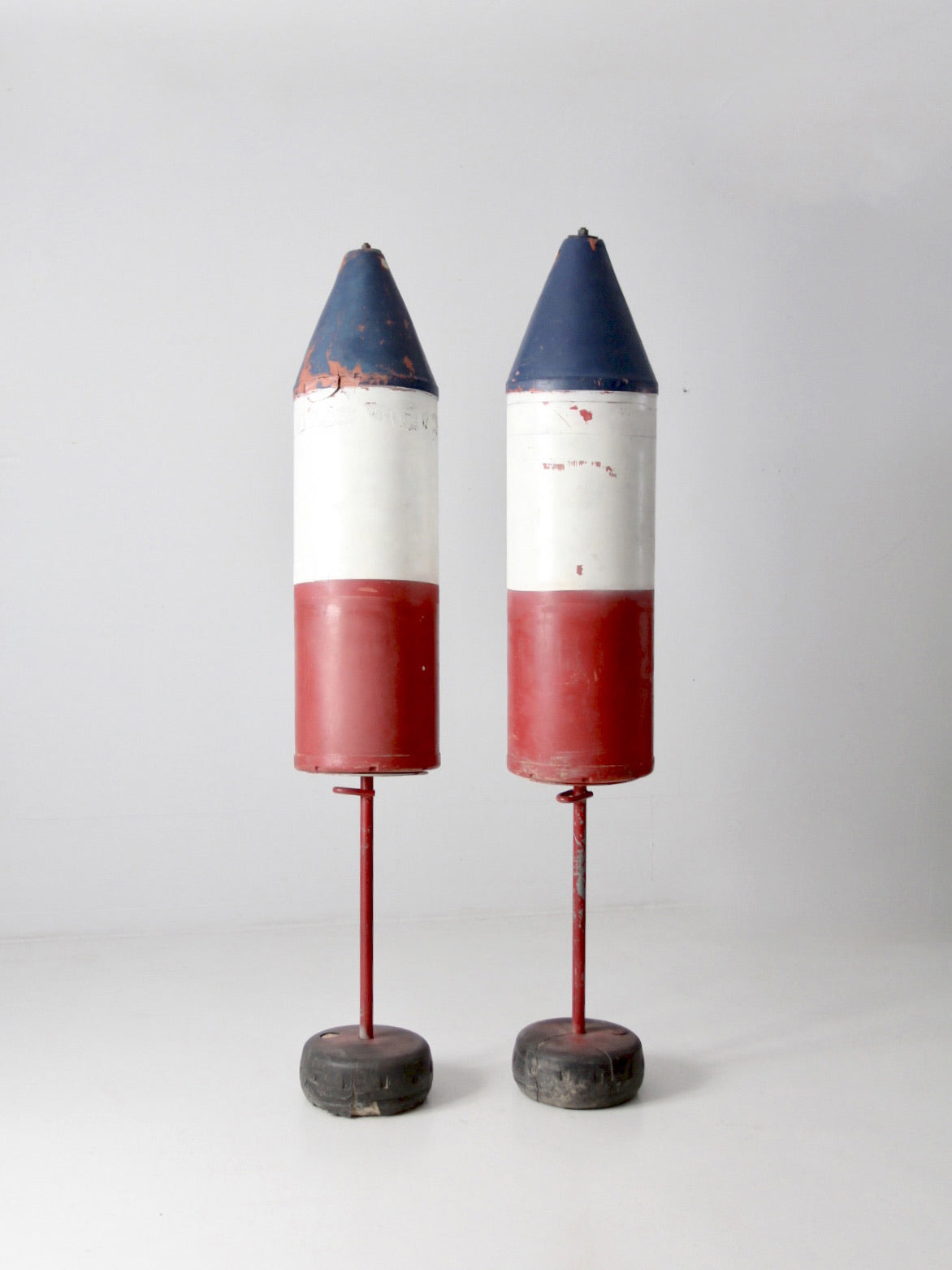 pair of vintage nautical marker buoys