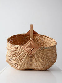 vintage wicker buttocks basket with floral trim