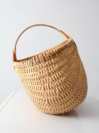 vintage wicker buttocks basket with floral trim