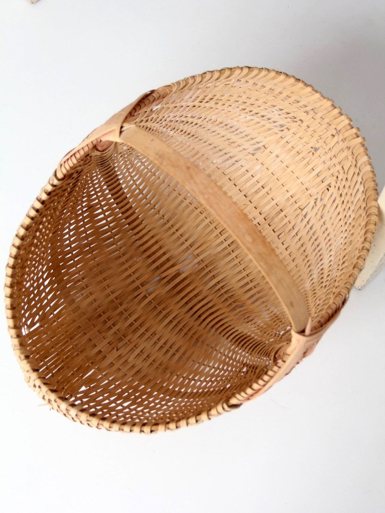 vintage wicker buttocks basket with floral trim