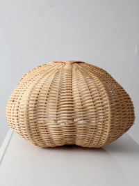 vintage wicker buttocks basket with floral trim