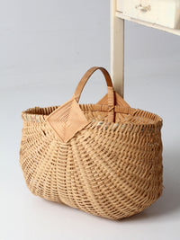 vintage wicker buttocks basket with floral trim