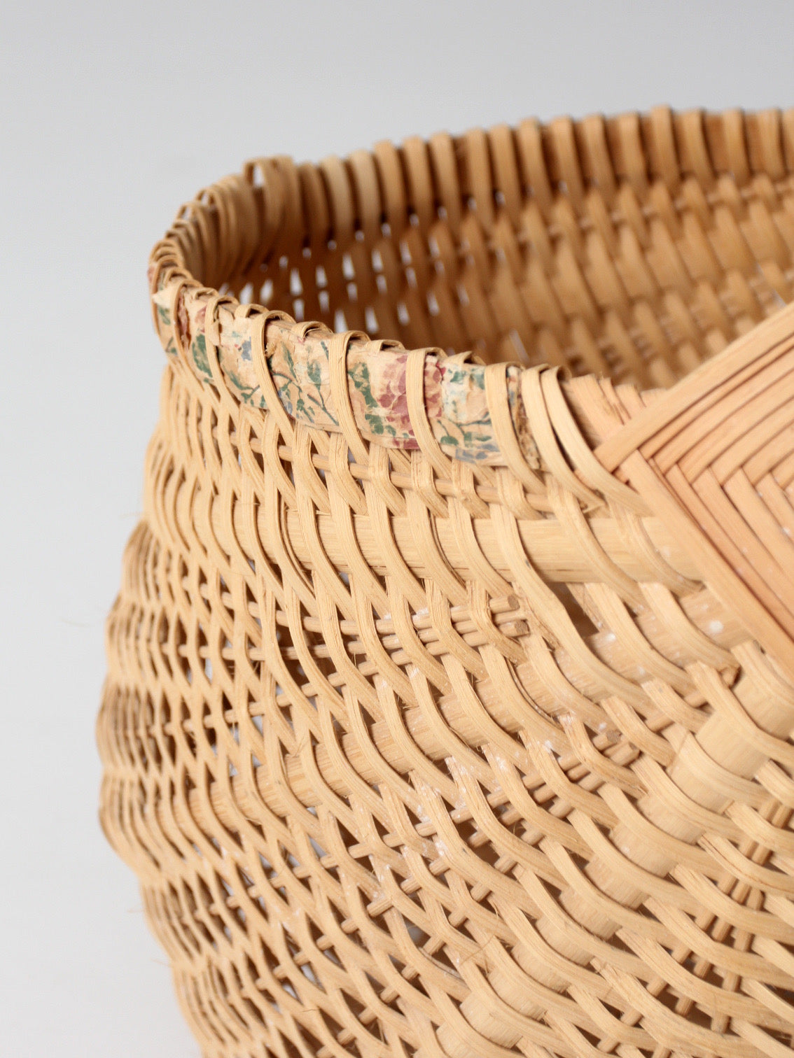 vintage wicker buttocks basket with floral trim