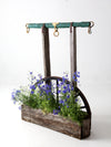 vintage folk art wagon wheel planter