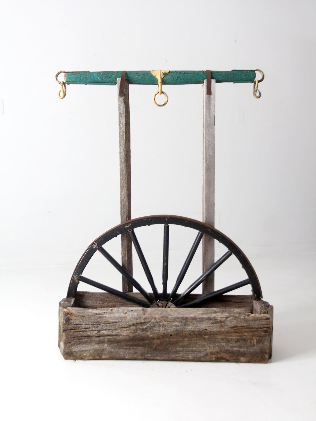 vintage folk art wagon wheel planter