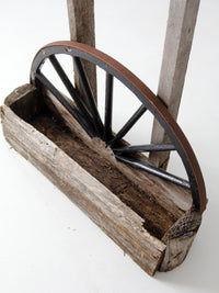 vintage folk art wagon wheel planter