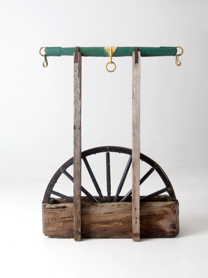 vintage folk art wagon wheel planter