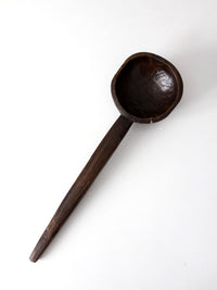 primitive hand-carved wooden spoon