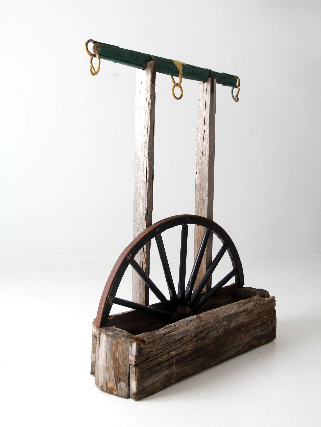 vintage folk art wagon wheel planter