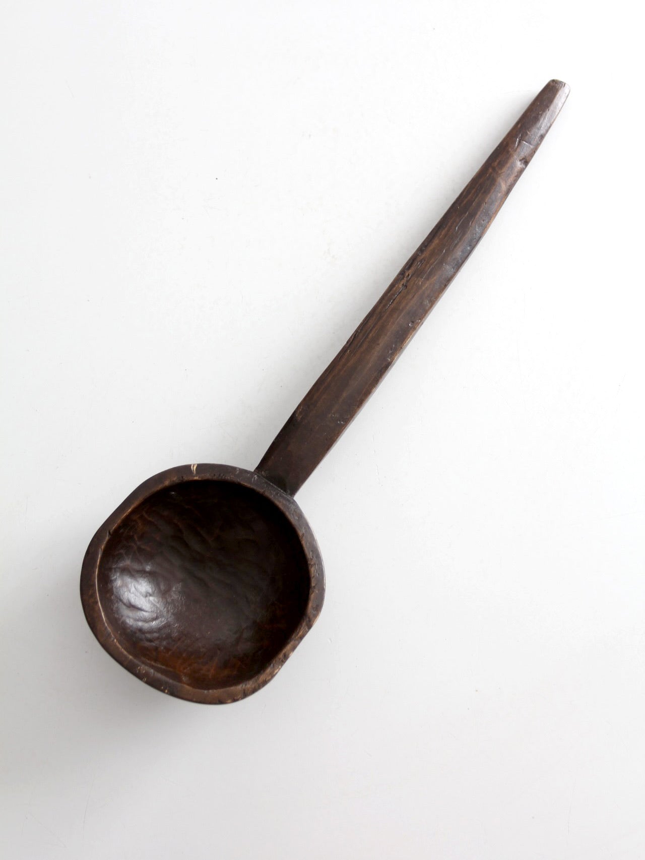 primitive hand-carved wooden spoon