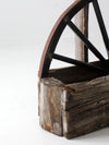 vintage folk art wagon wheel planter