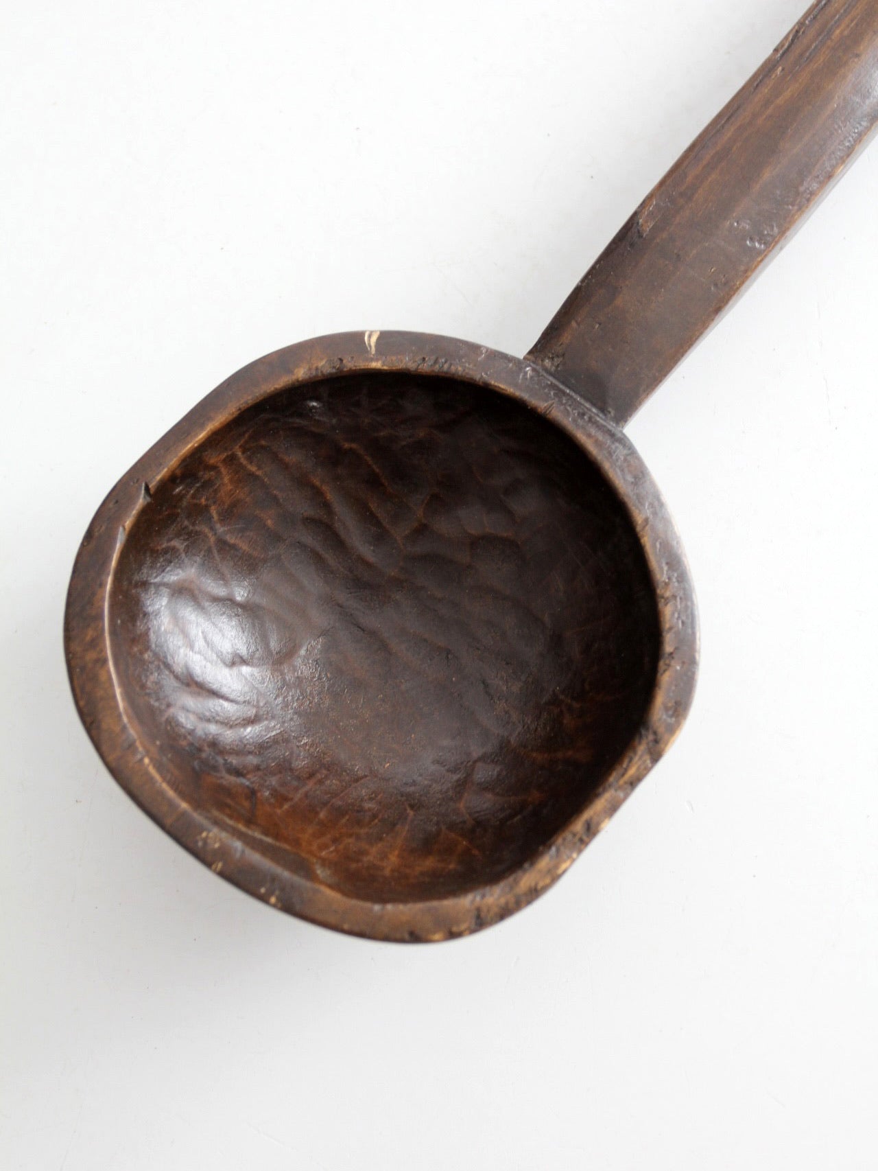 primitive hand-carved wooden spoon