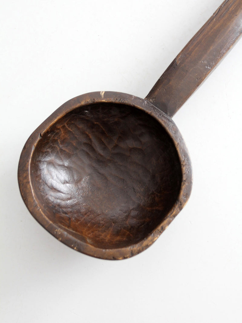 primitive hand-carved wooden spoon