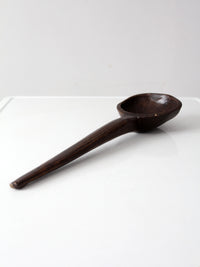 primitive hand-carved wooden spoon