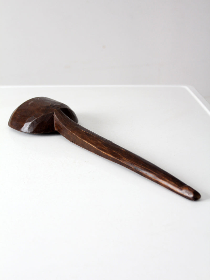 primitive hand-carved wooden spoon