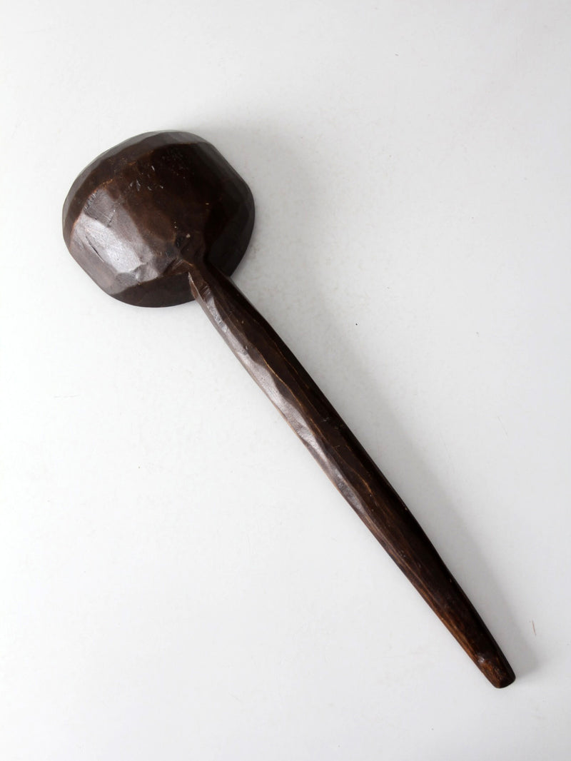 primitive hand-carved wooden spoon