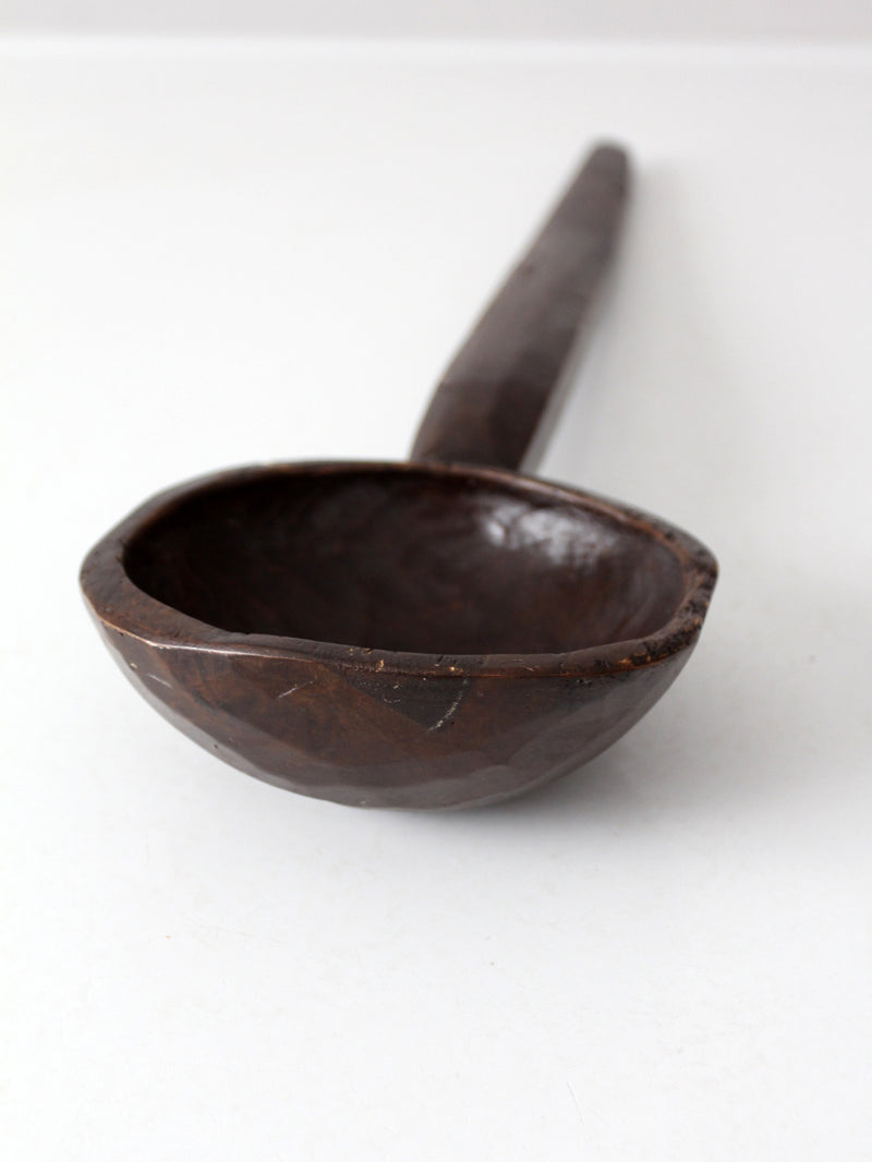 primitive hand-carved wooden spoon