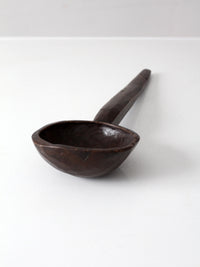 primitive hand-carved wooden spoon