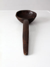 primitive hand-carved wooden spoon
