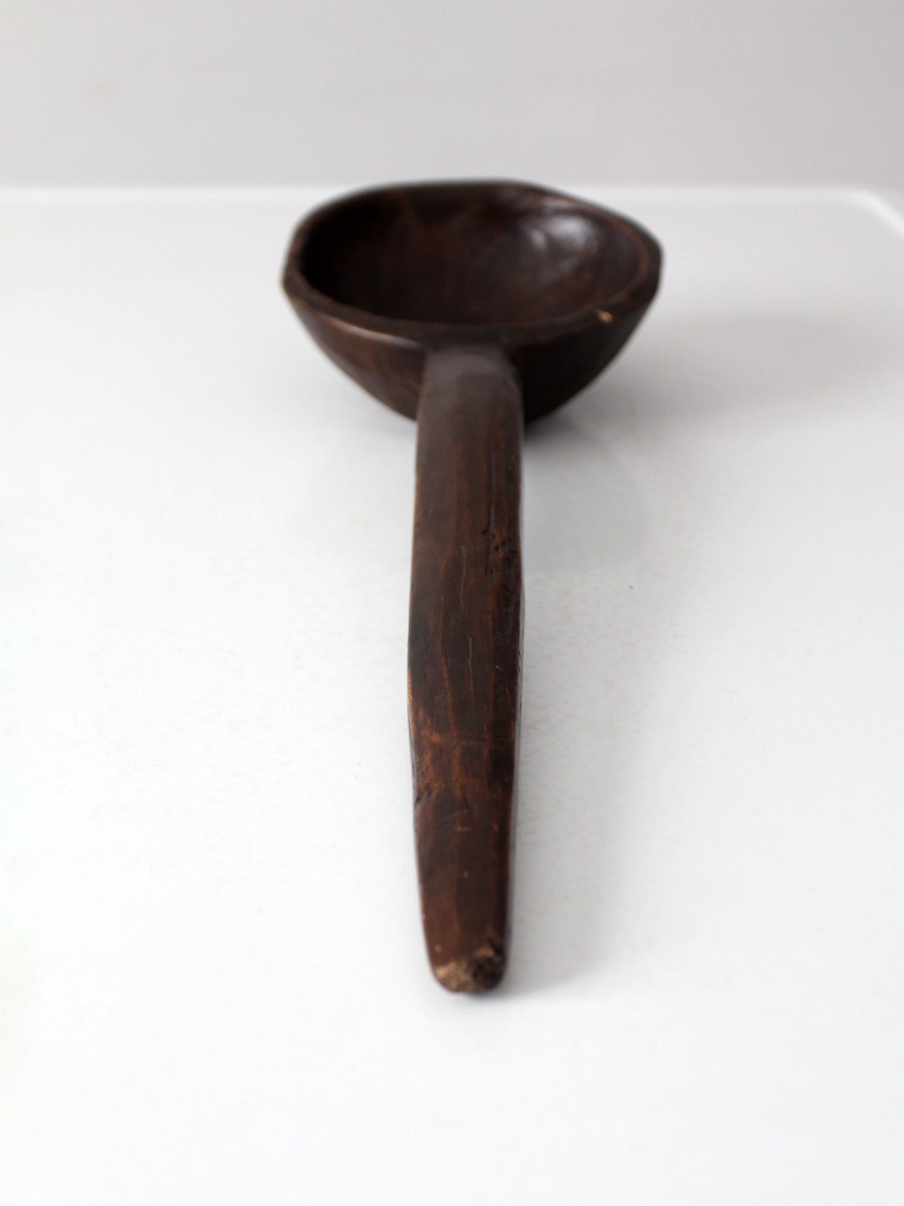 primitive hand-carved wooden spoon