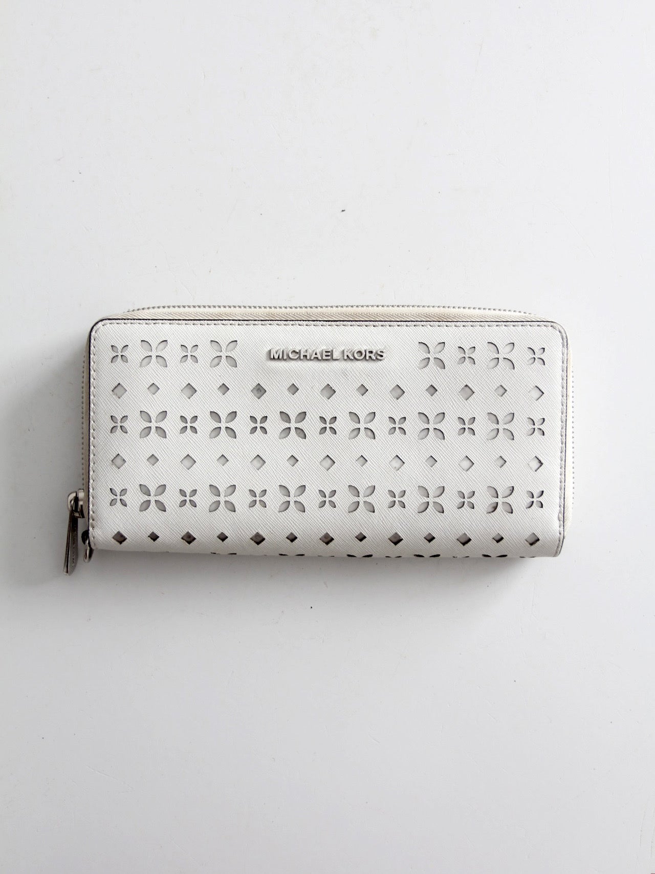 Michael Kors perforated zip around wallet