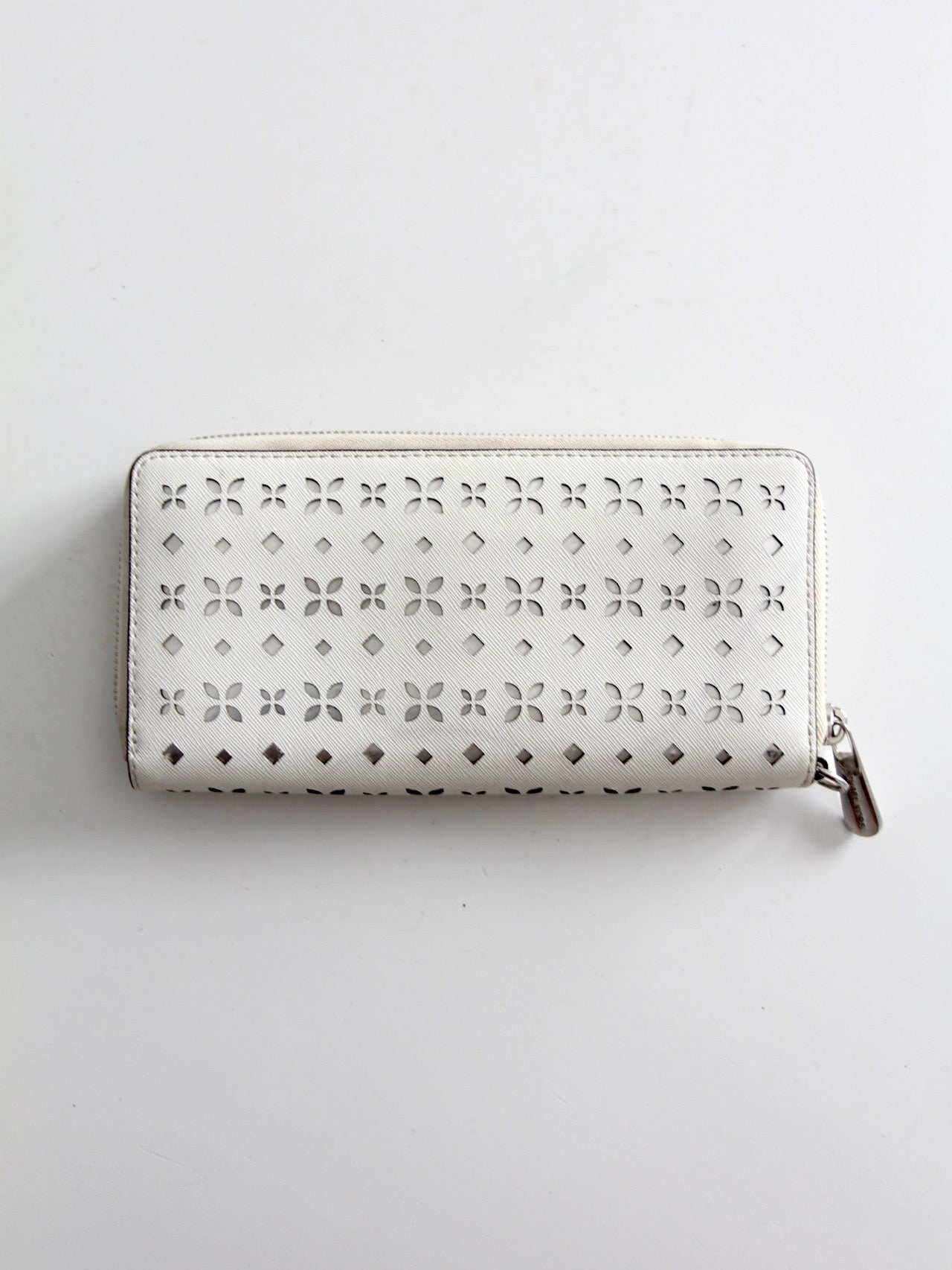 Michael Kors perforated zip around wallet