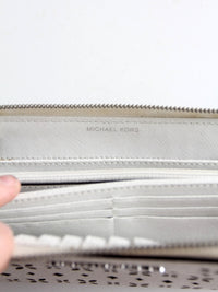 Michael Kors perforated zip around wallet