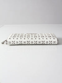 Michael Kors perforated zip around wallet