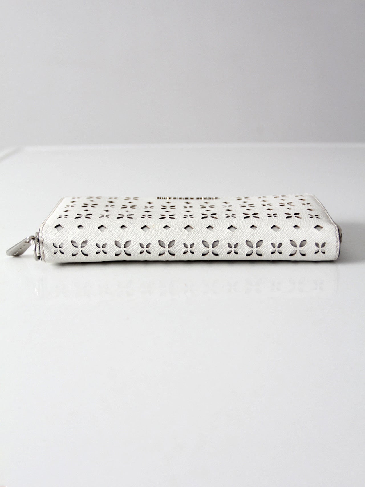 Michael Kors perforated zip around wallet